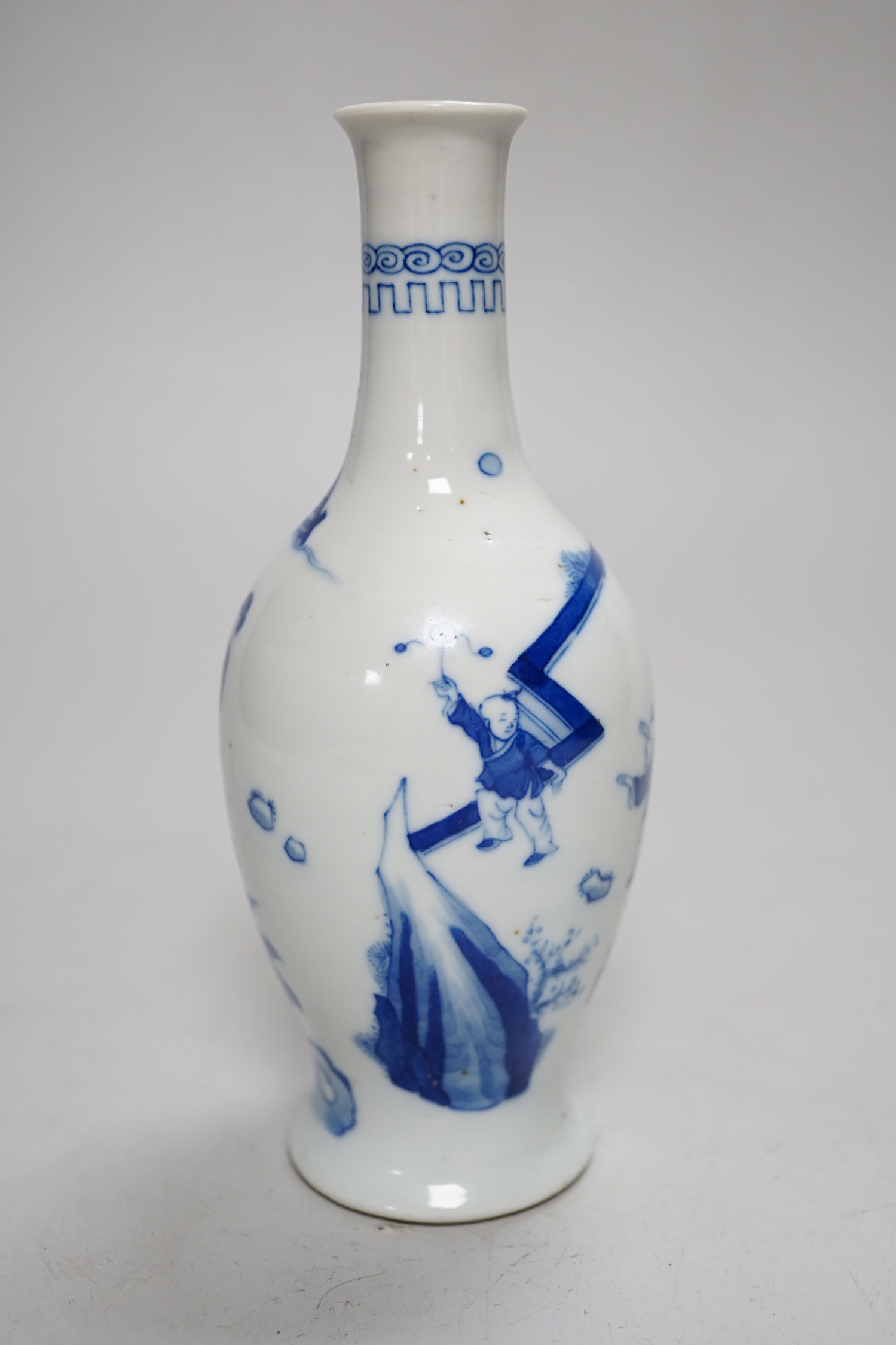 A small Chinese blue and white bottle vase, 17cm high